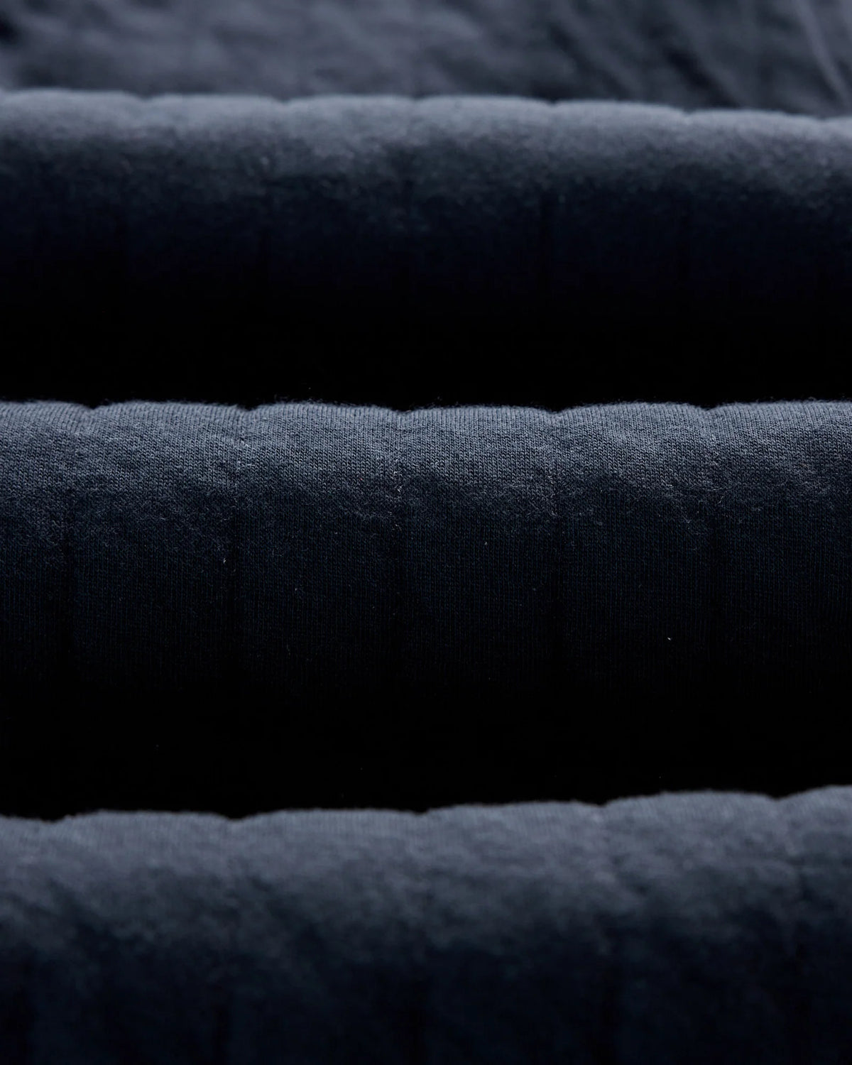 The Apres Pant in Heather Midnight Quilted Jersey